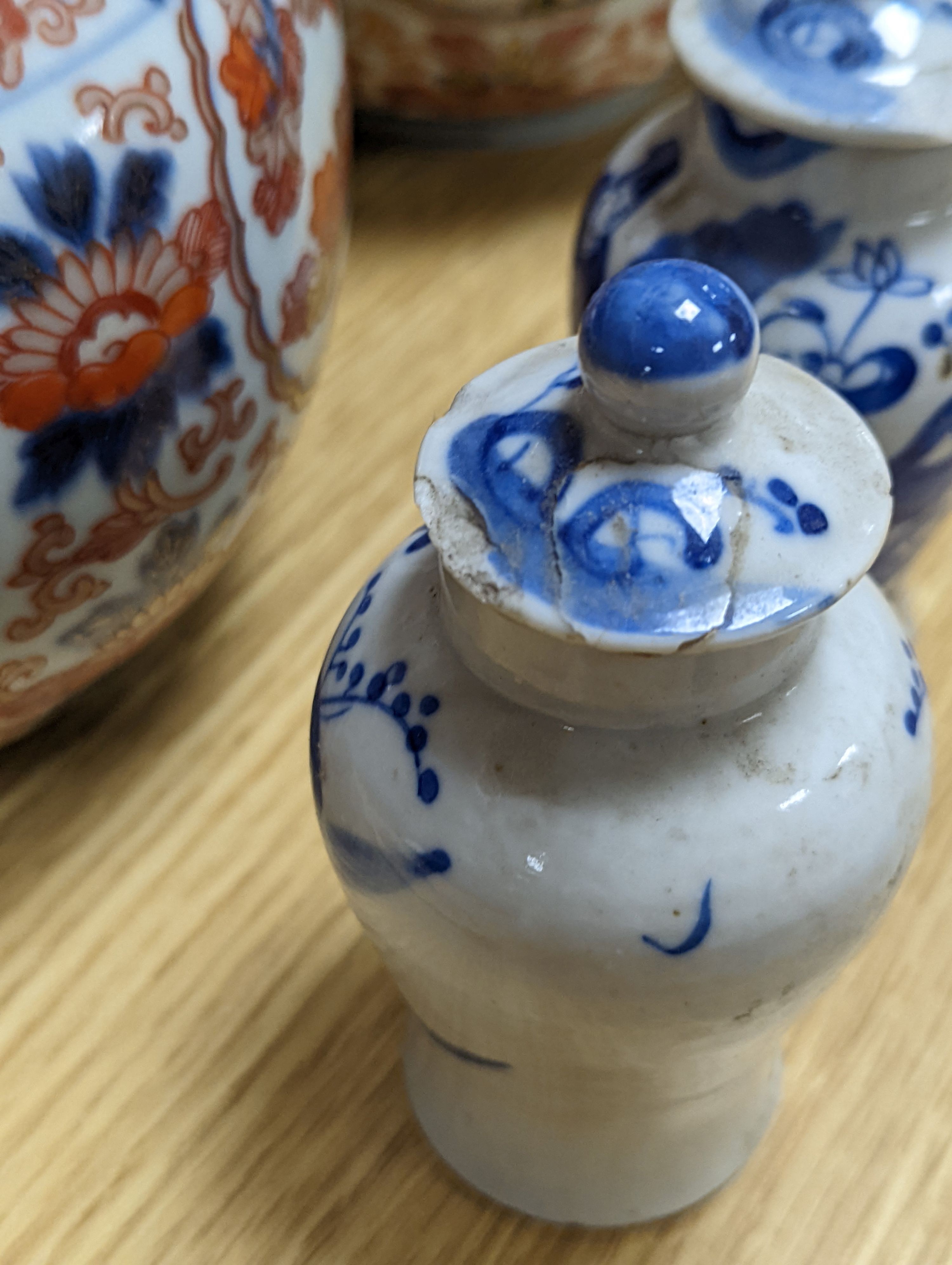 An 18th century Chinese famille rose dish, crackle-glaze stem cup, Beijing glass tea bowl and a Chinese Imari plate. Largest 24cm